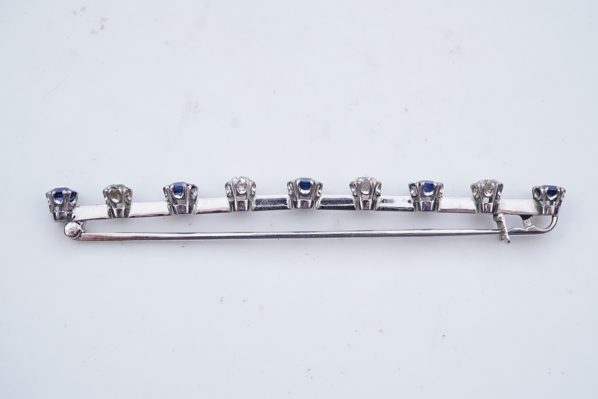 A diamond and sapphire bar brooch, early 20th century